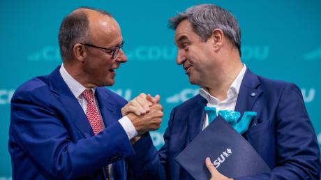 Geht einer von beiden für die Union ins Rennen ums Bundeskanzleramt 2025? Friedrich Merz (links) halten die Deutschen laut einer Umfrage für geeigneter als Markus Söder.